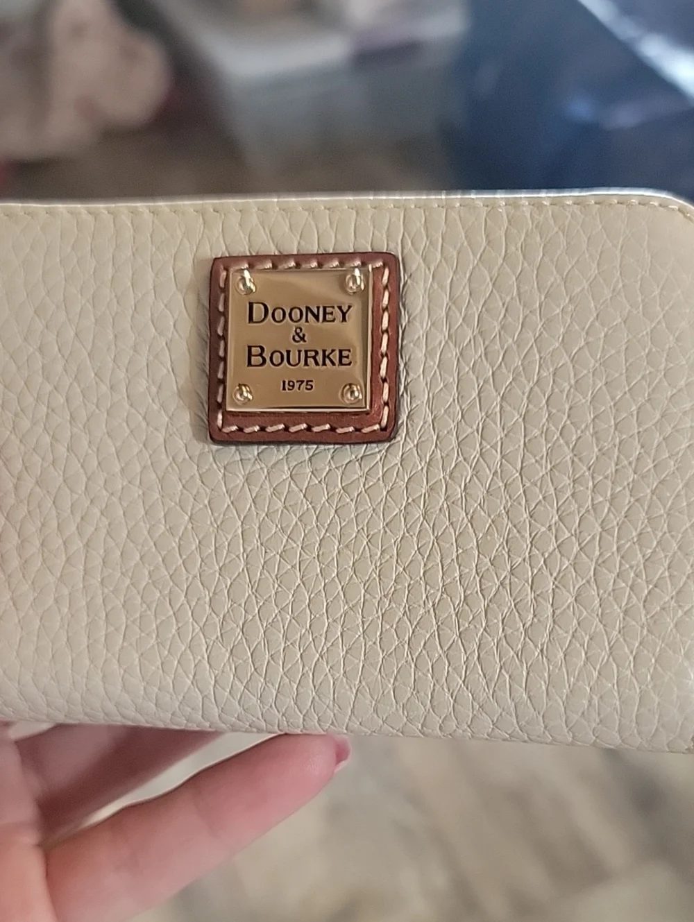 Dooney & Bourke  Pebbled Leather Zip-Around Wallet In Bone